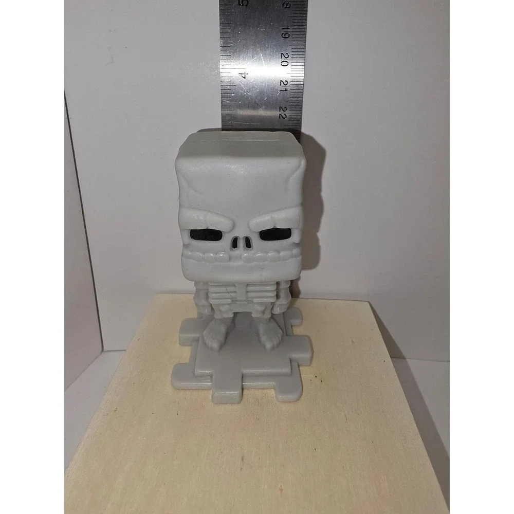 McDonald's Happy Meal toy featuring a skeleton character from the 2025 Minecraft